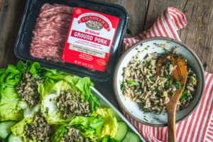 Lettuce Wraps and Hempler's Ground Pork Package on a table.