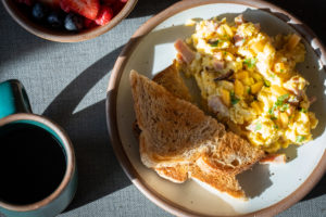 Breakfast setting with a plate of eggs