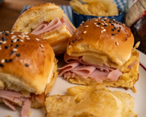 Hawaiian rolls filled with sliced Hempler's ham, pineapple and melted Swiss cheese.